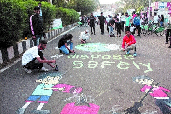 Volunteers painting roads