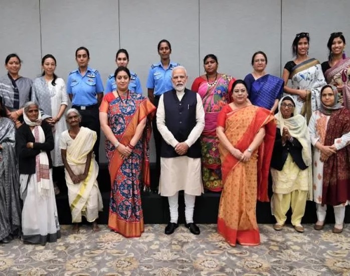 PM interacts with awardee