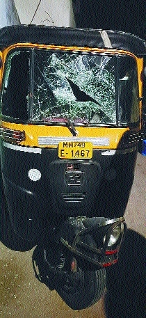 An autorickshaw damaged b