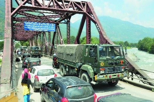 Army trucks move towards 
