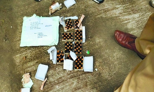 Parcel containing air  gun