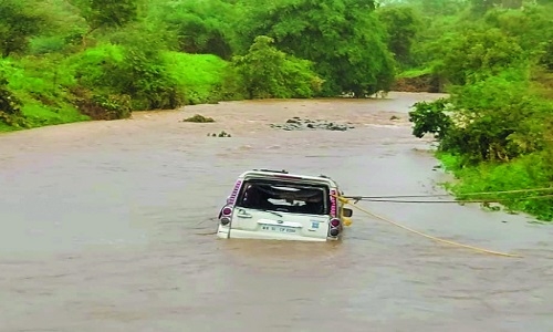 6 in SUV swept away 
