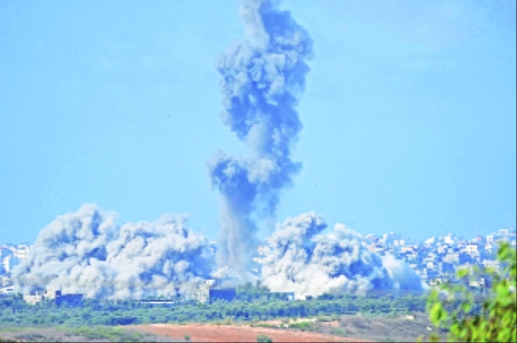 Smoke rises following an Israeli airstrike.jpg
