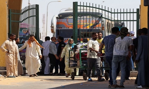 Sudanese fleeing fighting flood