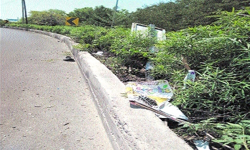 motorcycle hits divider