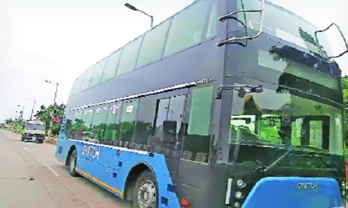 double-decker electric green bus