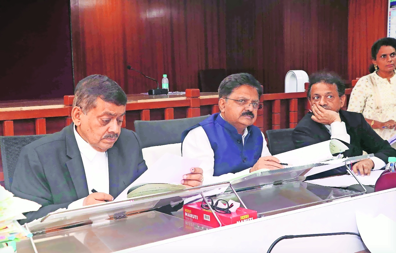 Justice Vinay Joshi with other panel members