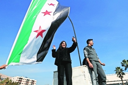 Syrians celebrate at Umayyad Square in Aleppo S