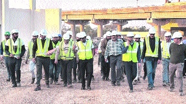 Metro Official accompanying Metro MD S Krishn