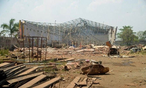 Explosion aftermath: Damaged permanent structures razed