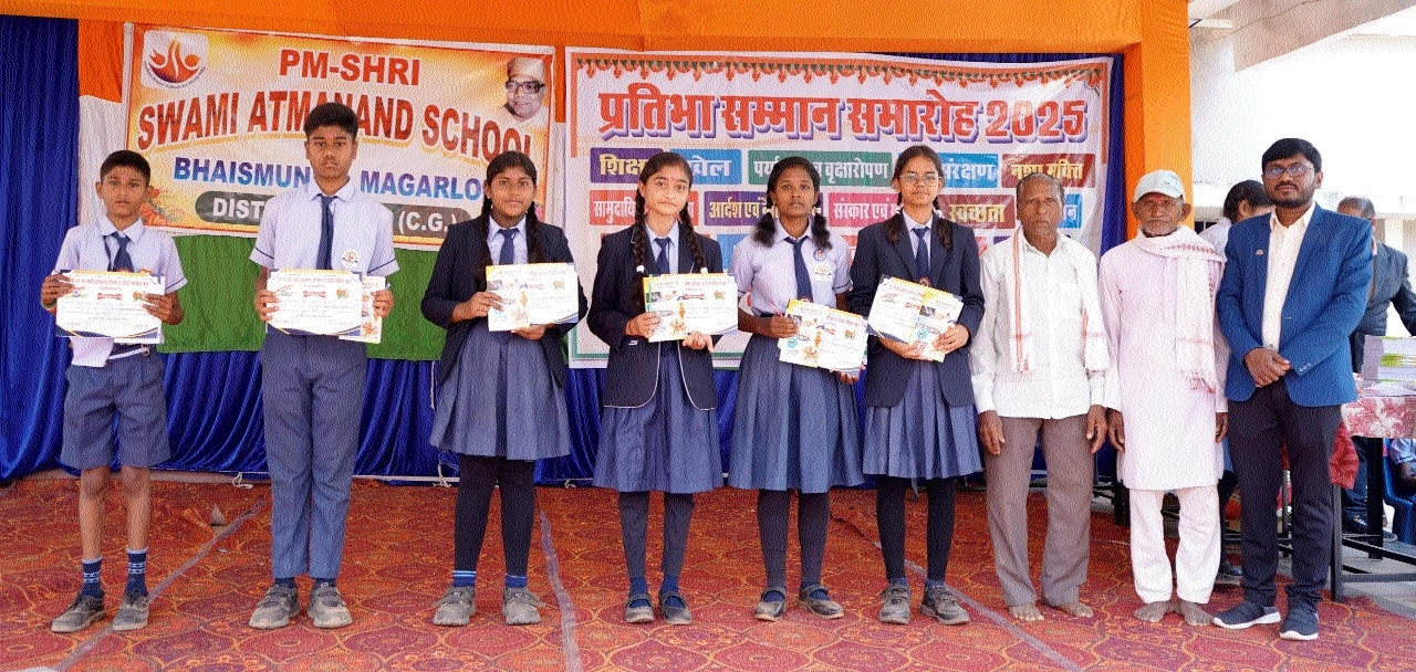 Students posing for a photo with their trophy
