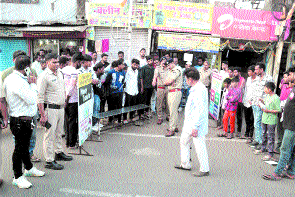 Driver in car with police sticker