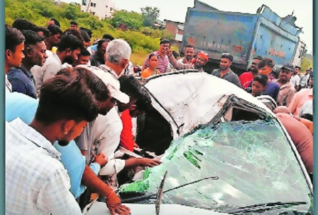People rescuing those trapped in the ill-fated car after the mishap