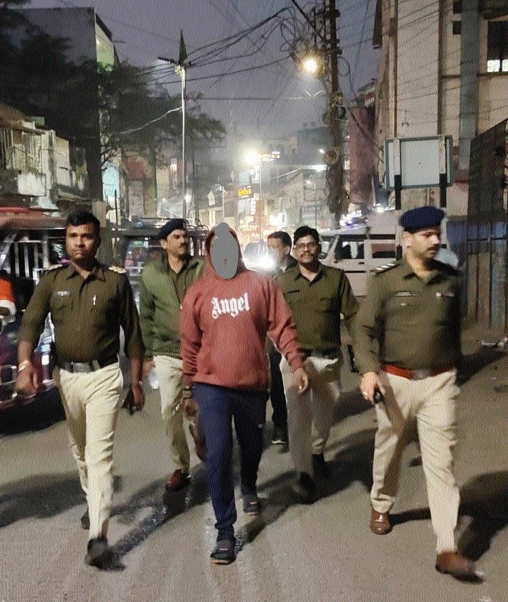 Omti police taking out a procession of accused of murder