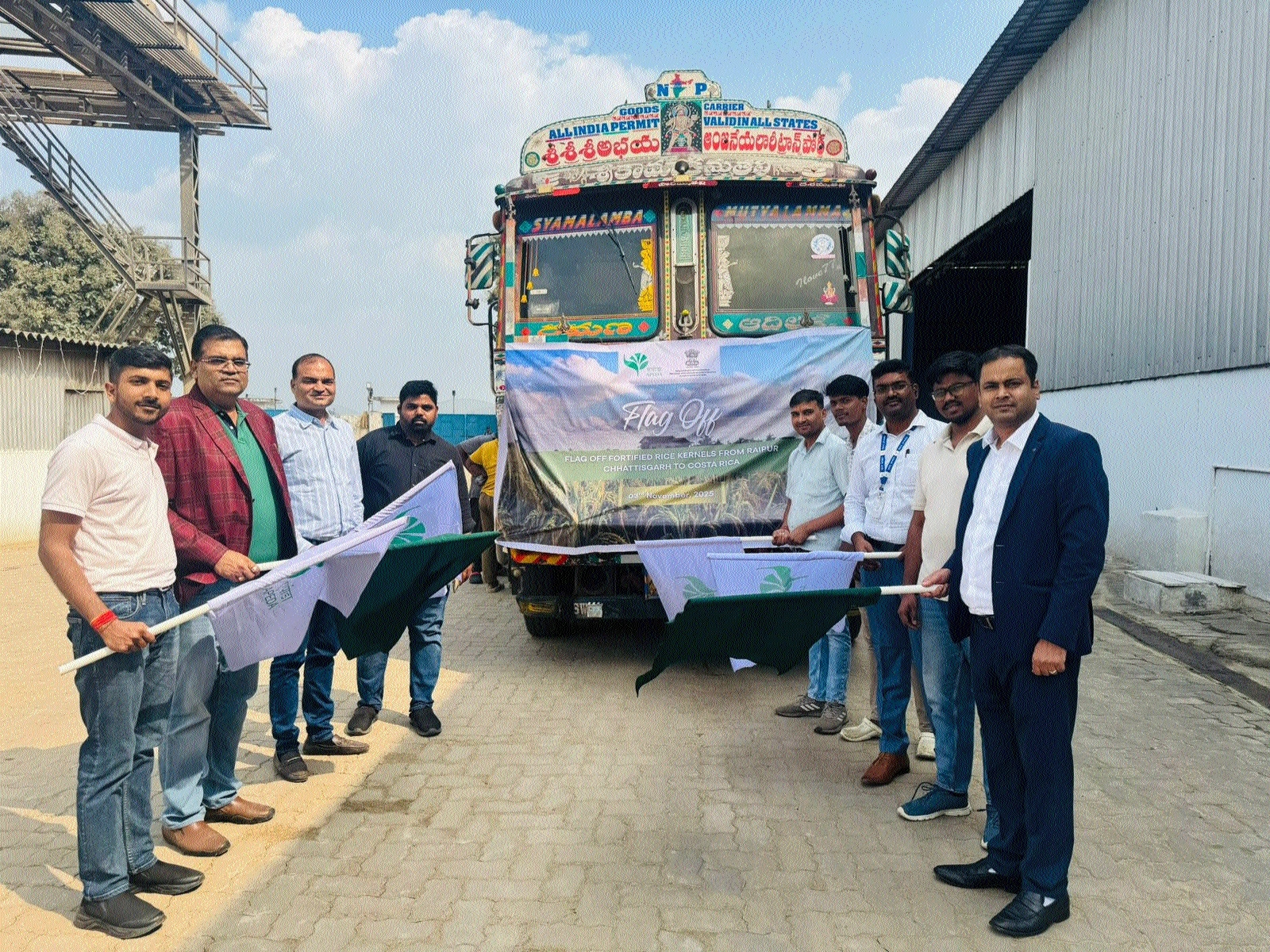 Officials flagging off the vehicle carrying Fortified Rice Kernel