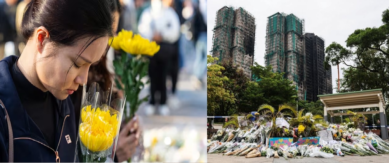 A makeshift flower memorial near the buildings after the deadly fire in Hong Kong on Sunday