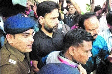 Saurabh Sharma being taken to the jail