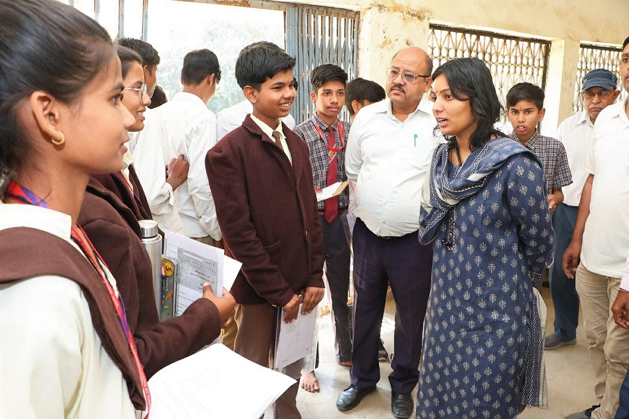 Collector Sheetla Patel interacting with students 