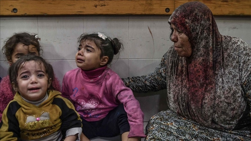 Palestinians inspect the damage