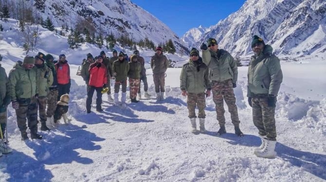 Army peronnel during rescue work after several labourers