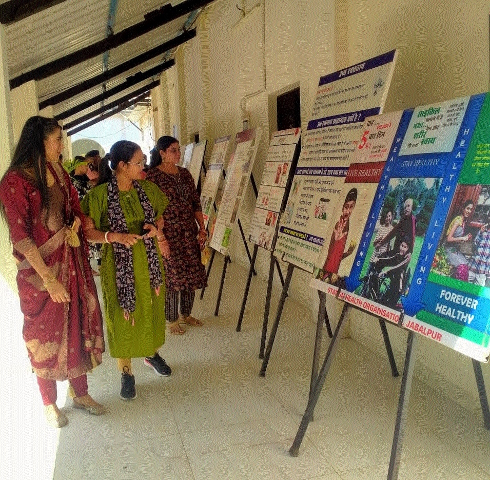 Women exploring the posters