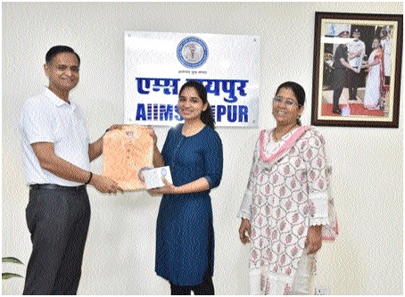 Dr Raima Mariam John being greeted for her achievement