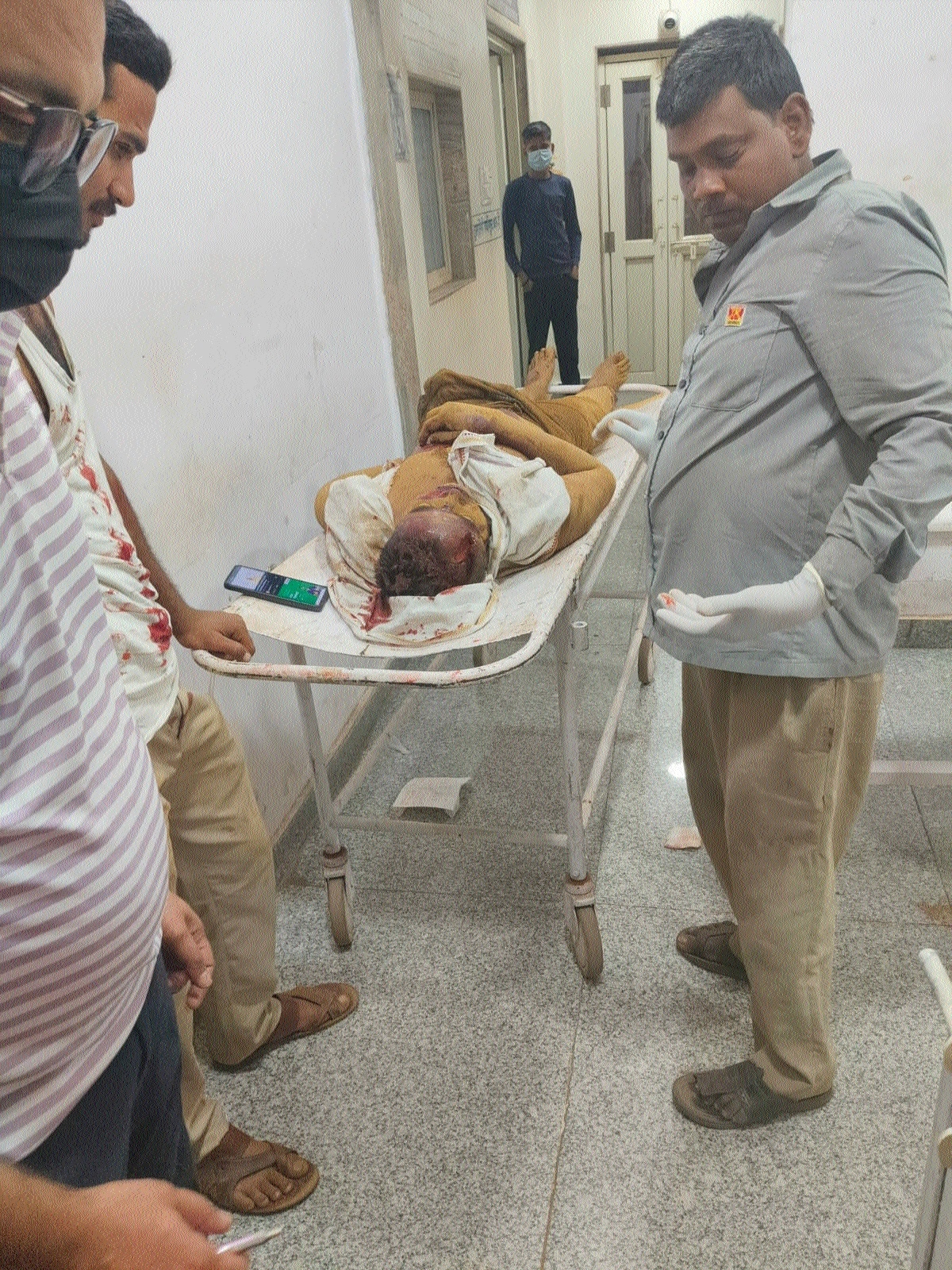 The injured man being taken to hospital for 