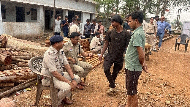 Police teams carry out a surprise 