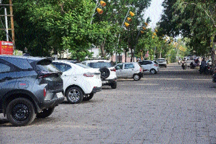 Local businessmen park their cars in the Cultural Street