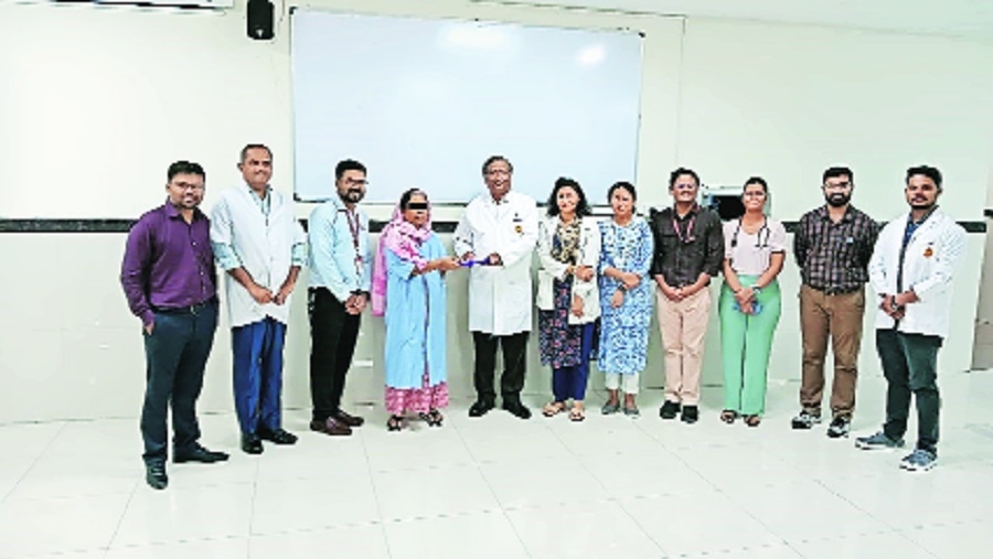Dr Prashant Joshi with the patient and doctors 