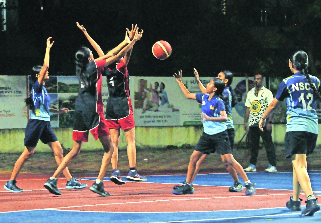 Players of SKS and NSCA in action during the Rajurkar 