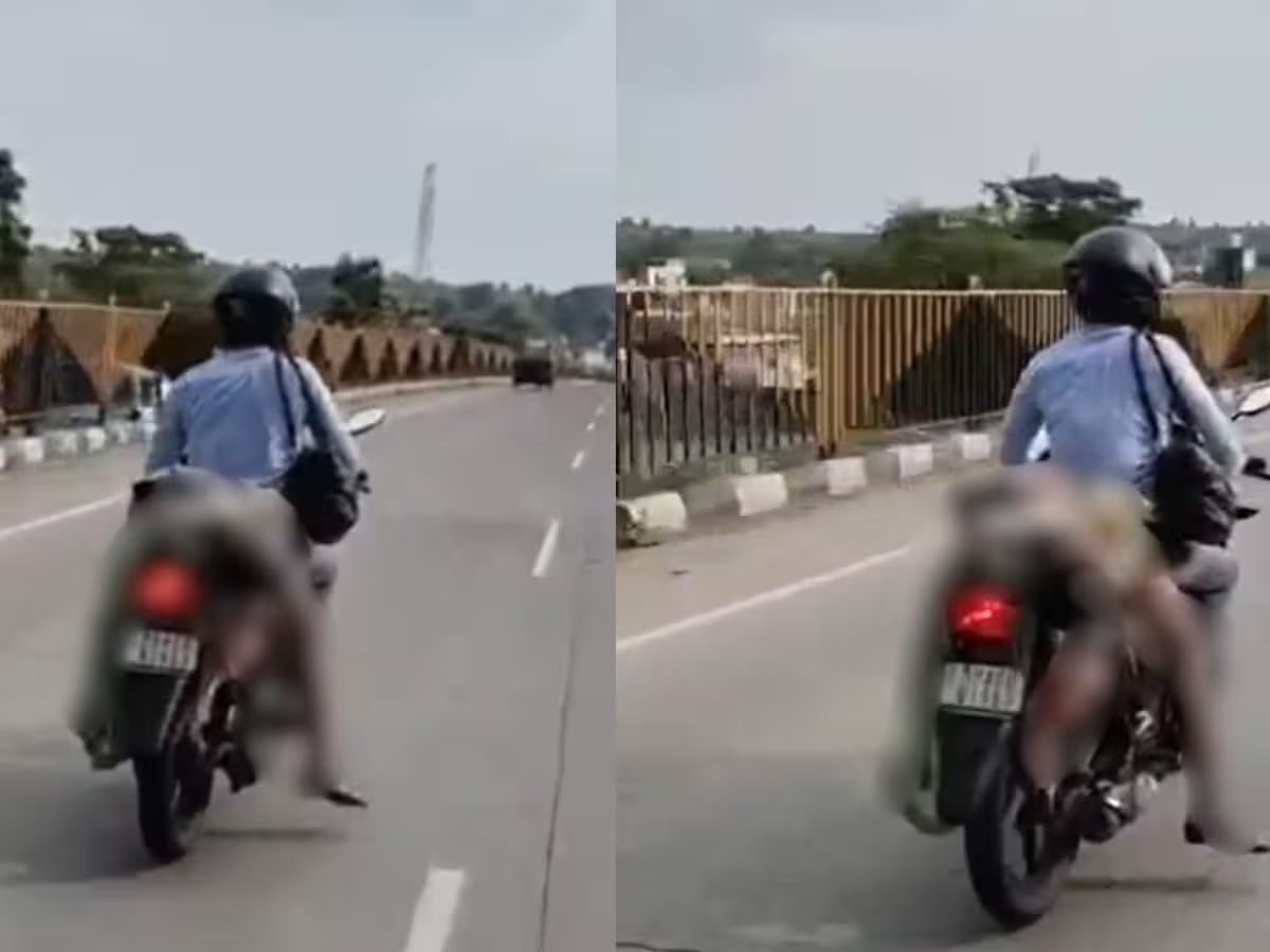 Man carries wifes body on motorcycle after passersby