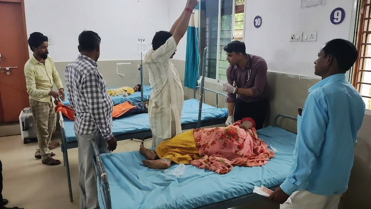The woman and her children being attended by doctors in hospital