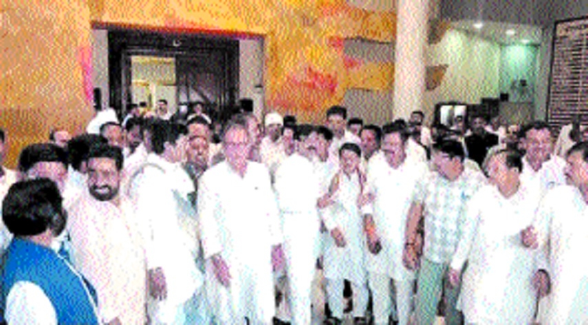 Legislators coming out of the House after staging a walk out