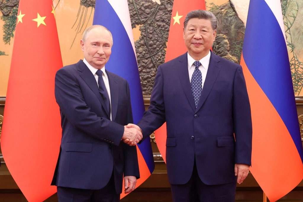 Xi Putin reaffirm old friend ties