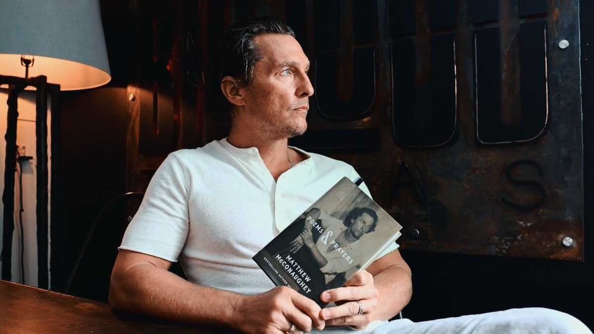 Mathew McConaughey with book