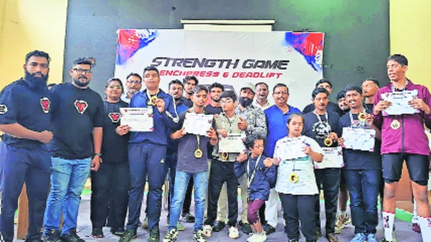 Varsha shows power lifts twin titles
