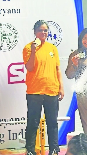 Rohini wins natl bench press gold 