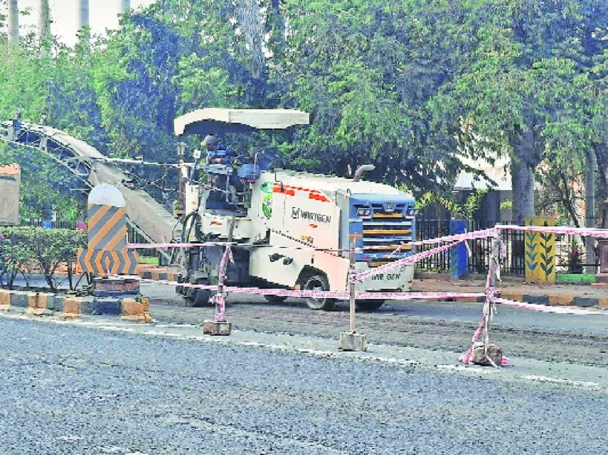 Cement road construction in front of Dr Vasantrao Deshpande Hall