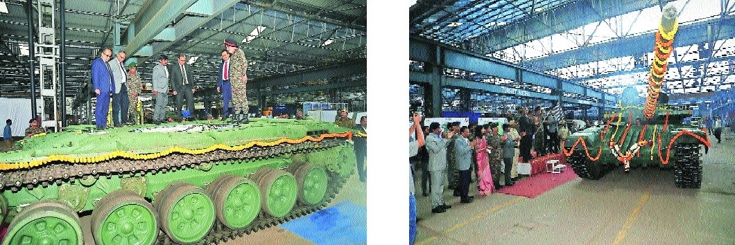 Officers inspecting the overhauled tank Above Overhauled 