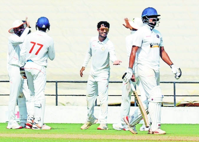 Vidarbhas Aman Mokhade celebrates with team-mates after taking one of his three Pondicherry wickets at VCAs Jamtha Stadium 