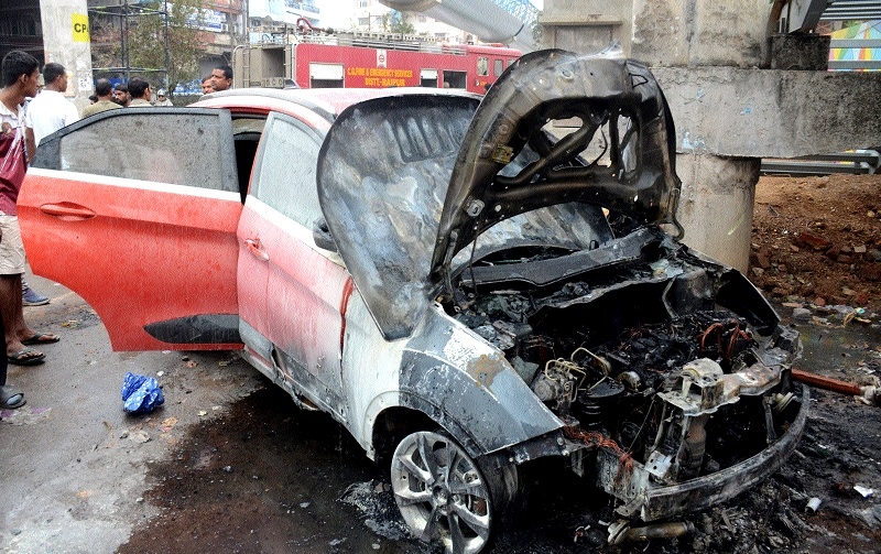 Parked car suddenly catches fire