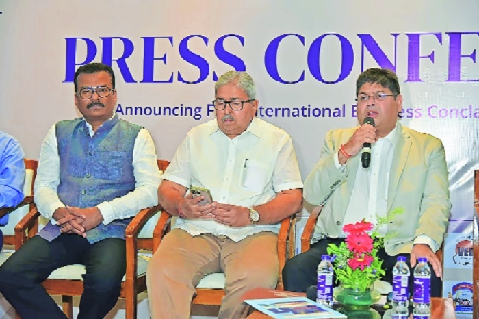 Ashish Kale addressing the gathering while Sanjay Gupta and 