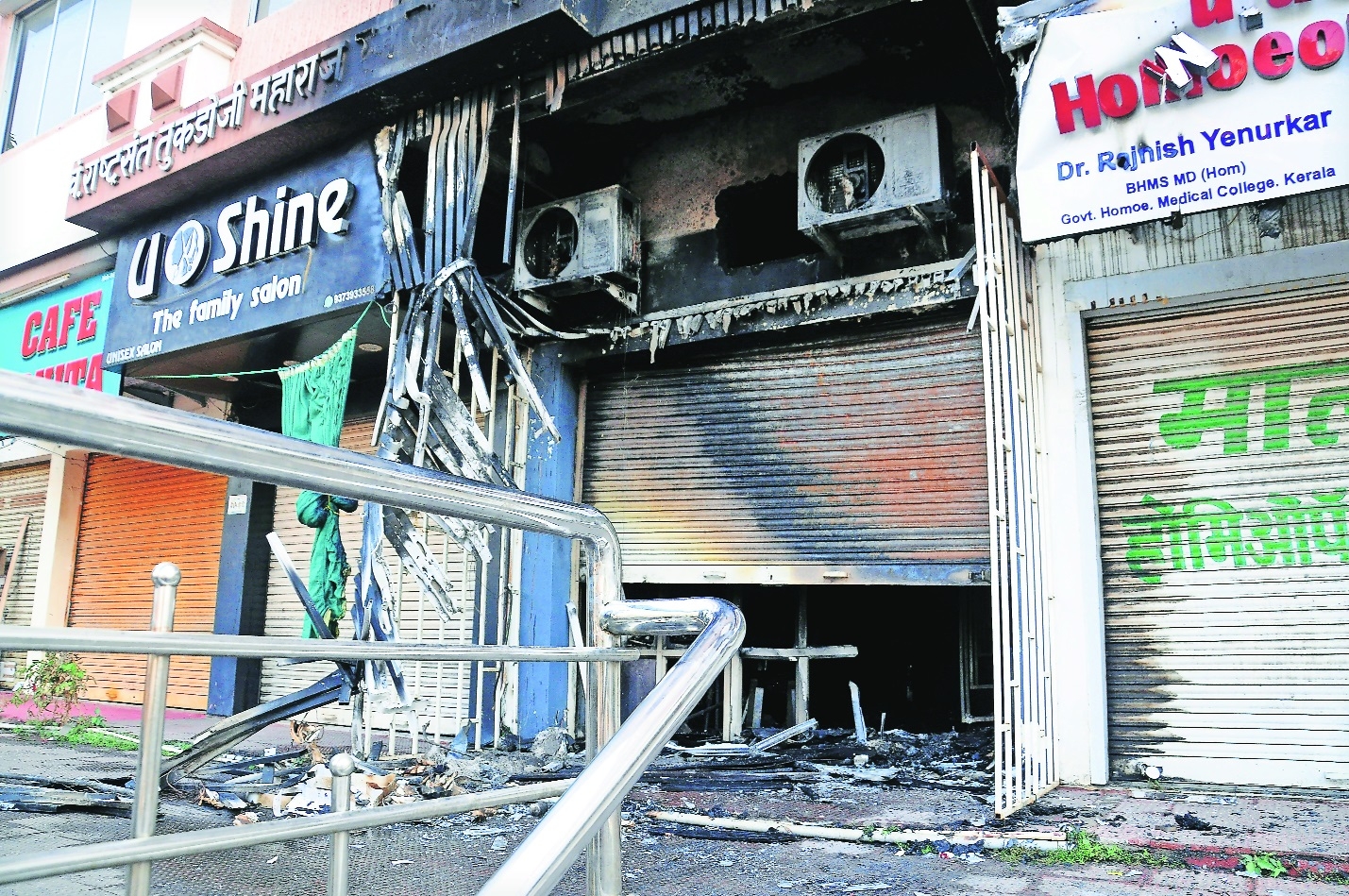 The cafe set afire by the goons late in the night