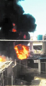 Massive fire breaks out at 3-storey building in old city, Blaze suspected to have started during illegal animal fat processing on rooftop