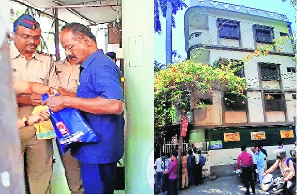 Police personnel with the cache of explosive material