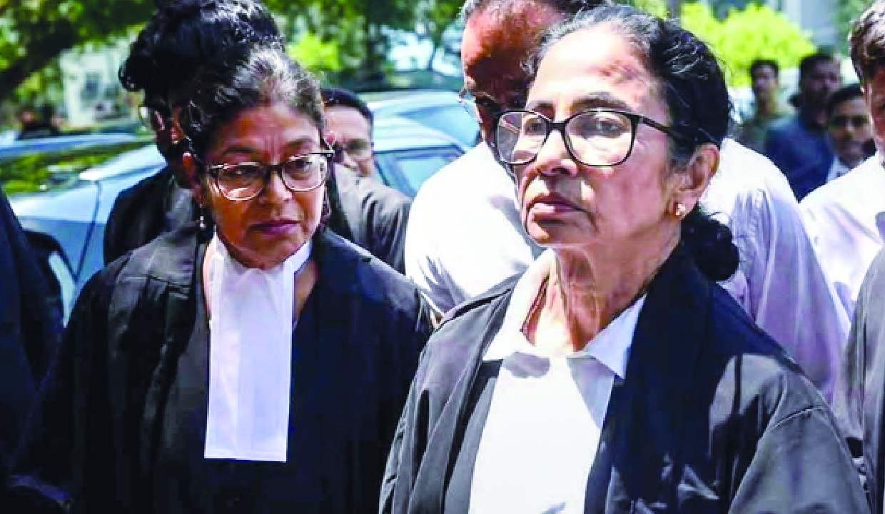 Post-poll violence case Mamata appears in lawyers robes at HC