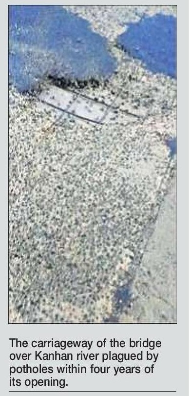 Potholes expose iron 