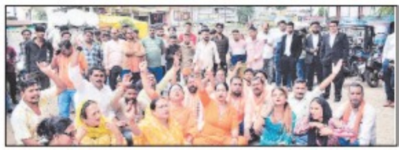 Hindu Dharm Sena activists,residents stage demos infront of Adhartal Police Stn