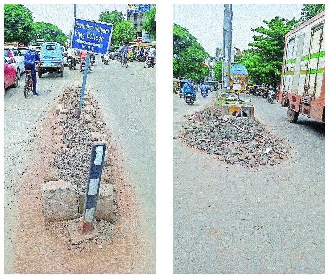 Broken divider potholes trouble 